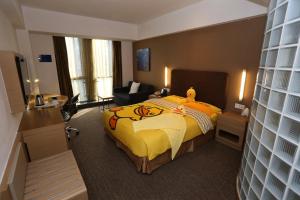 Ein Bett oder Betten in einem Zimmer der Unterkunft Holiday Inn Express Shanghai Jinsha by IHG