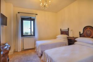 Pietra Campana Italian Villa Orvieto客房内的一张或多张床位