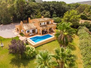 an aerial view of a house with a swimming pool at Villa Zahara in Alcudia