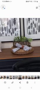 a shelf with two umbrellas on a table at Hunter Cottage Euroa in Euroa