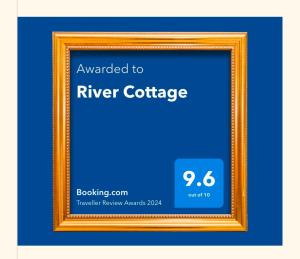 Majutusasutuses River Cottage olev sertifikaat, autasu, silt või muu dokument