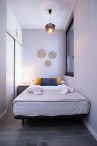 a bedroom with a large bed in a room at Patacona by Concept Flats in Valencia