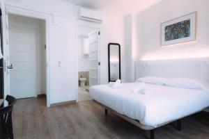 Postel nebo postele na pokoji v ubytování Concept Rooms