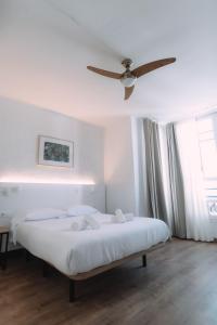 Postel nebo postele na pokoji v ubytování Concept Rooms