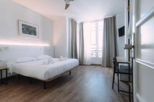 Postel nebo postele na pokoji v ubytování Concept Rooms