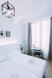 Postel nebo postele na pokoji v ubytování Concept Rooms