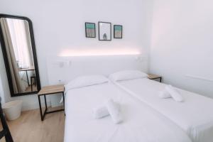 Postel nebo postele na pokoji v ubytování Concept Rooms