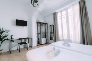Postel nebo postele na pokoji v ubytování Concept Rooms
