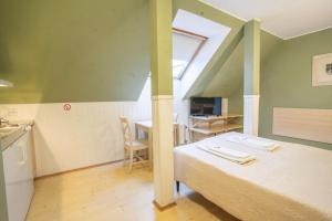 Postel nebo postele na pokoji v ubytování Kongo Hotel