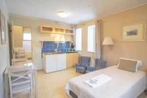 Kuchyň nebo kuchyňský kout v ubytování Kongo Hotel