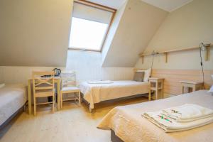 Postel nebo postele na pokoji v ubytování Kongo Hotel