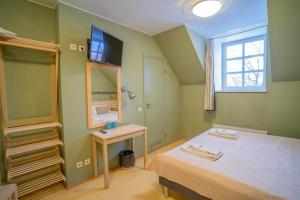 Postel nebo postele na pokoji v ubytování Kongo Hotel