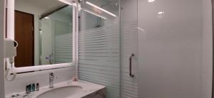 Koupelna v ubytování Hotel Kapalai Semporna