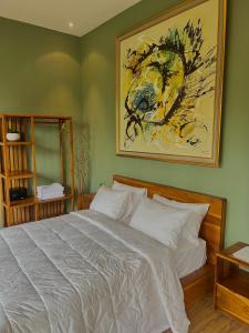 Postel nebo postele na pokoji v ubytování Ardan Maison Ubud