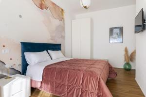 Posteľ alebo postele v izbe v ubytovaní Cas’ A Mare - Beachfront Luxury Suites