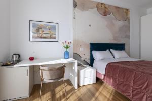 Posteľ alebo postele v izbe v ubytovaní Cas’ A Mare - Beachfront Luxury Suites