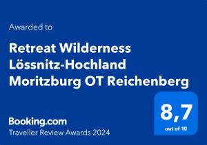 Et logo, certifikat, skilt eller en pris der bliver vist frem på Retreat Wilderness Lössnitz-Hochland Moritzburg OT Reichenberg