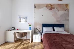 Posteľ alebo postele v izbe v ubytovaní Cas’ A Mare - Beachfront Luxury Suites