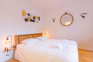 Postel nebo postele na pokoji v ubytování Le Saquet - Studio vue montagne