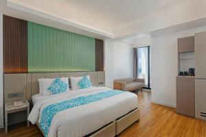 Letto o letti in una camera di Arena Beach Hotel
