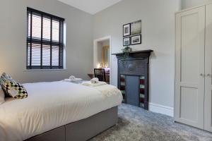 Säng eller sängar i ett rum på Spacious homely 1 Bed Apartment in Hartlepool