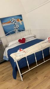 Säng eller sängar i ett rum på Moretti Home