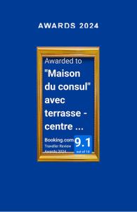 una imagen de un cartel en un marco dorado en "Maison du consul" avec terrasse - centre historique, en Narbona