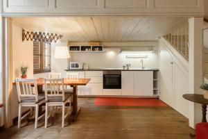 Kuchyňa alebo kuchynka v ubytovaní Lambertesca Loft by Mmega + 9 fotografií