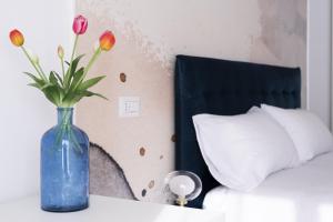 Posteľ alebo postele v izbe v ubytovaní Cas’ A Mare - Beachfront Luxury Suites
