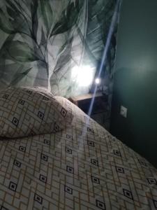 Postel nebo postele na pokoji v ubytování Dormir à l'usine Loft industriel Atypique