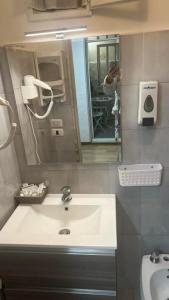 Ett badrum på Moretti Home