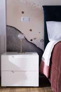 Posteľ alebo postele v izbe v ubytovaní Cas’ A Mare - Beachfront Luxury Suites