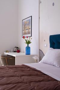 Posteľ alebo postele v izbe v ubytovaní Cas’ A Mare - Beachfront Luxury Suites