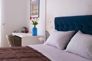 Posteľ alebo postele v izbe v ubytovaní Cas’ A Mare - Beachfront Luxury Suites