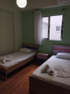 Postel nebo postele na pokoji v ubytování Pegasus Blossom