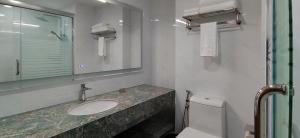 Koupelna v ubytování Hotel Kapalai Semporna