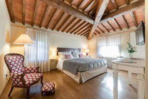 Voodi või voodid majutusasutuse Borgo I Vicelli Adults Only Relais toas