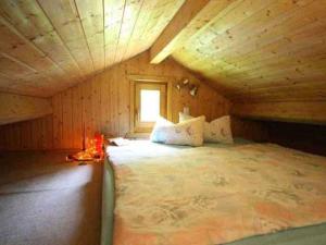 En eller flere senge i et værelse på b Ferienhaus Unterfranz I b