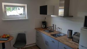 Kuchyň nebo kuchyňský kout v ubytování Ferienwohnung "Münsterblick"