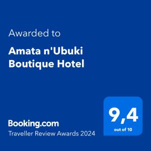 een blauw bord met de tekst toegekend aan het boetiekhotel amanta n ubuntu bij Amata n'Ubuki Boutique Hotel in Kigali