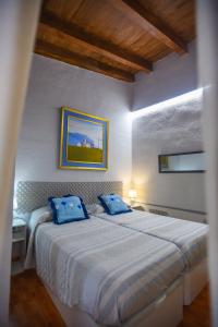 A bed or beds in a room at la casita de invitados
