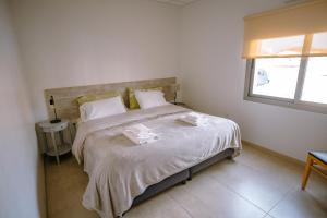 En eller flere senge i et værelse på Edificio Olascoaga Centro 2