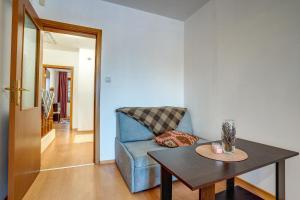 Posezení v ubytování MyPlace Pamporovo апартаменти за отдих + 108 fotografií