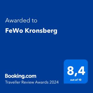 FeWo Kronsberg في Eldingen: لقطةشاشة هاتف مع النص الممنوح لفيفو kominker
