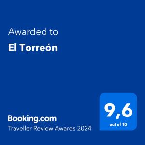 eine blaue Telefonleinwand mit dem Text, der El Toron verliehen wurde in der Unterkunft El Torreón in Soria