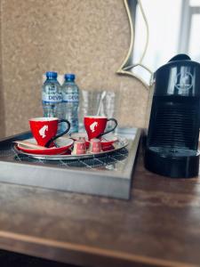 Удобства за правене на кафе и чай в Хотелски комплекс Белият кон