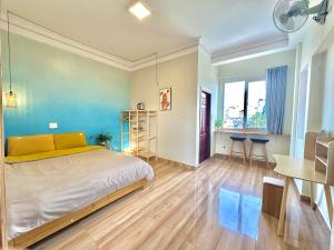 Postel nebo postele na pokoji v ubytování Nấm Home