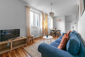 Μια τηλεόραση ή/και κέντρο ψυχαγωγίας στο Résidence Léon Blum - Appartements design - Parking +178 φωτογραφίες