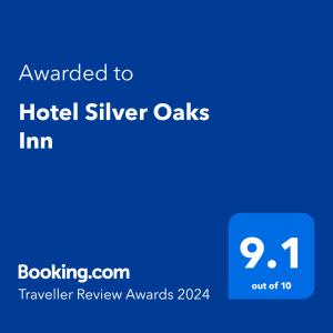 a blue text box with the words awarded to hotel silver oaks inn at Hotel Silver Oaks Inn in Pokhara