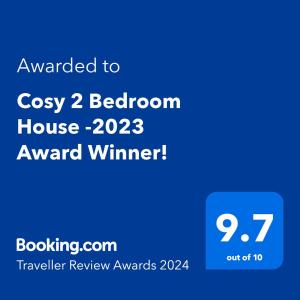 Сертифікат, нагорода, вивіска або інший документ, виставлений в Cosy 2 Bedroom House -2022 & 2023 Award Winner!